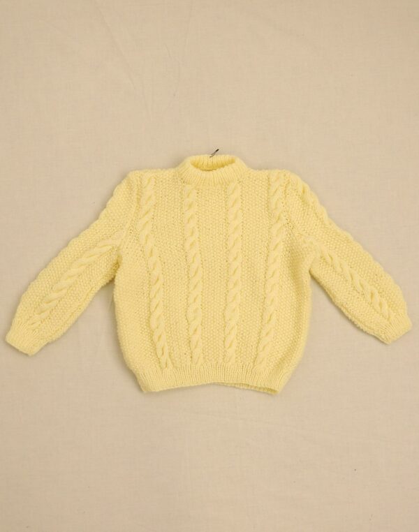 Pale yellow hand-knitted sweater