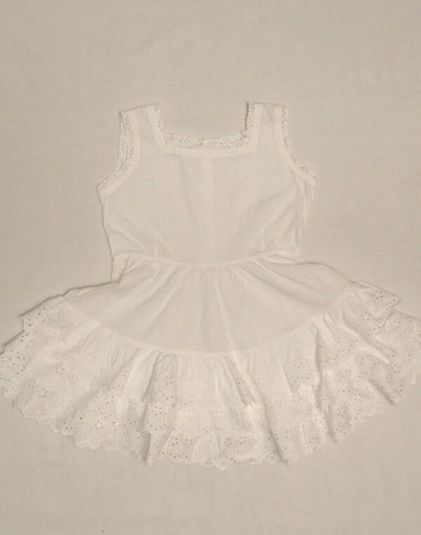 White dress with lace ruffles