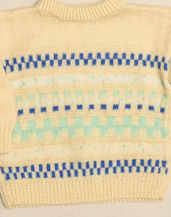 Pull tricoté main frises