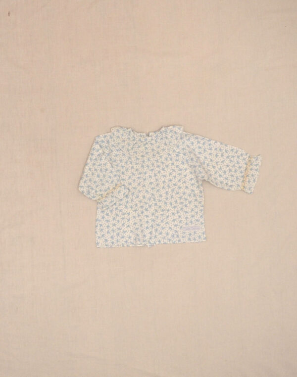 Blouse fleurie à grand col