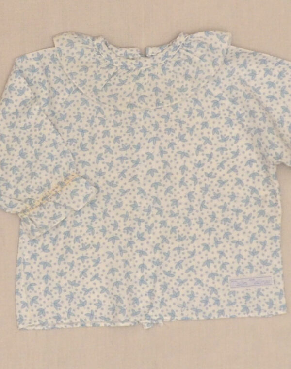 Blouse fleurie à grand col