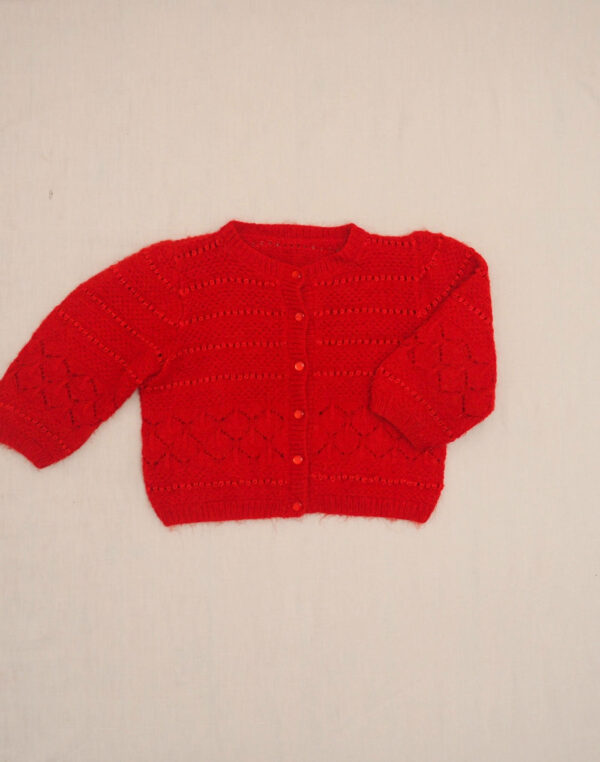 Hand-knitted red cardigan