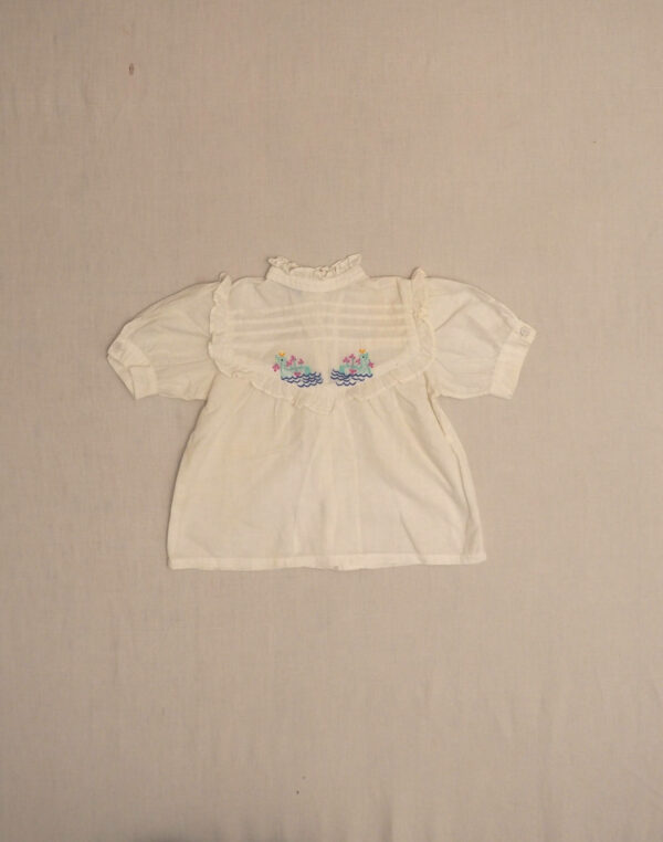 Ruffled embroidered blouse