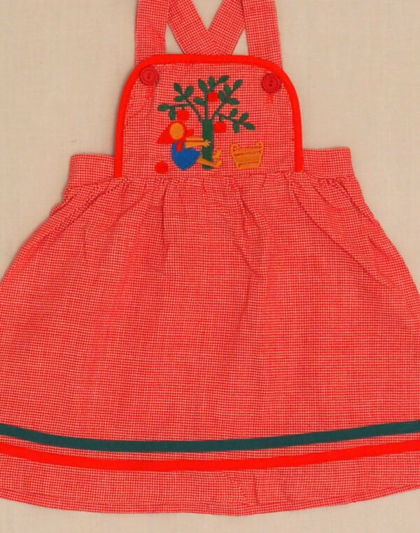 Robe tablier brodée