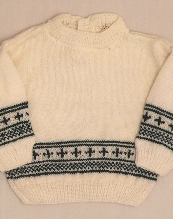 Pull tricoté main frise verte