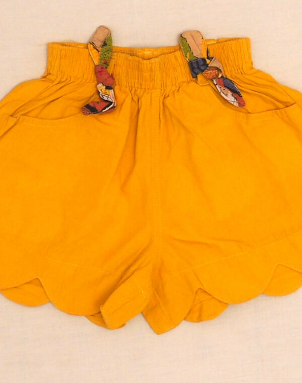 Yellow shorts with bows