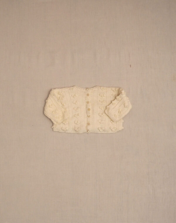 Hand-knitted popcorn-stitch cardigan