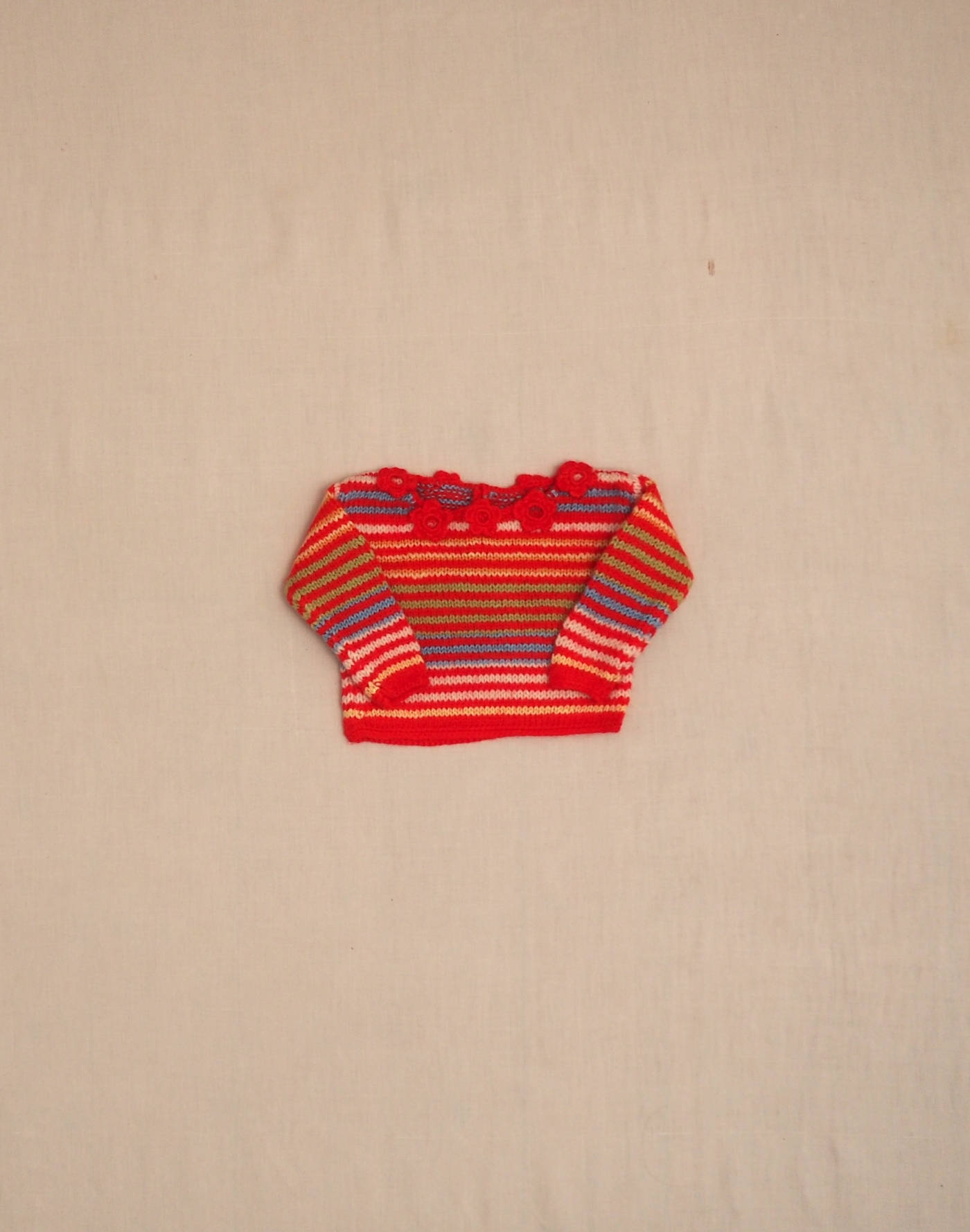 Striped hand-knitted sweater