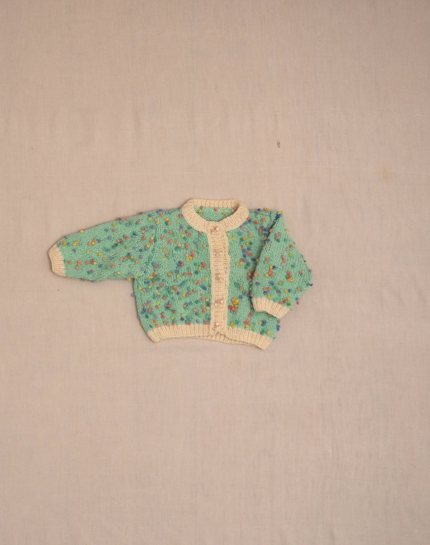 Hand-knitted confetti cardigan