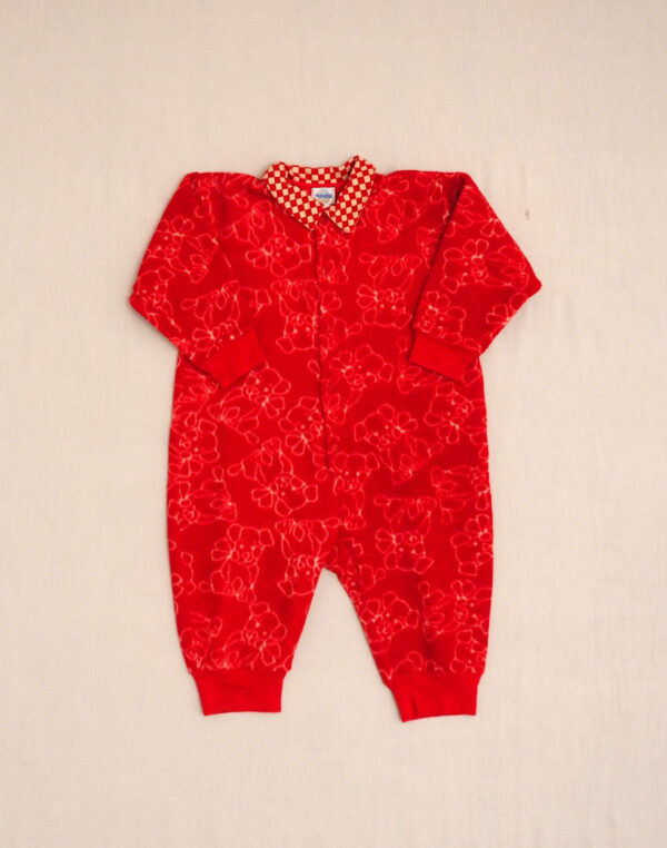 Fleece romper with dog motif