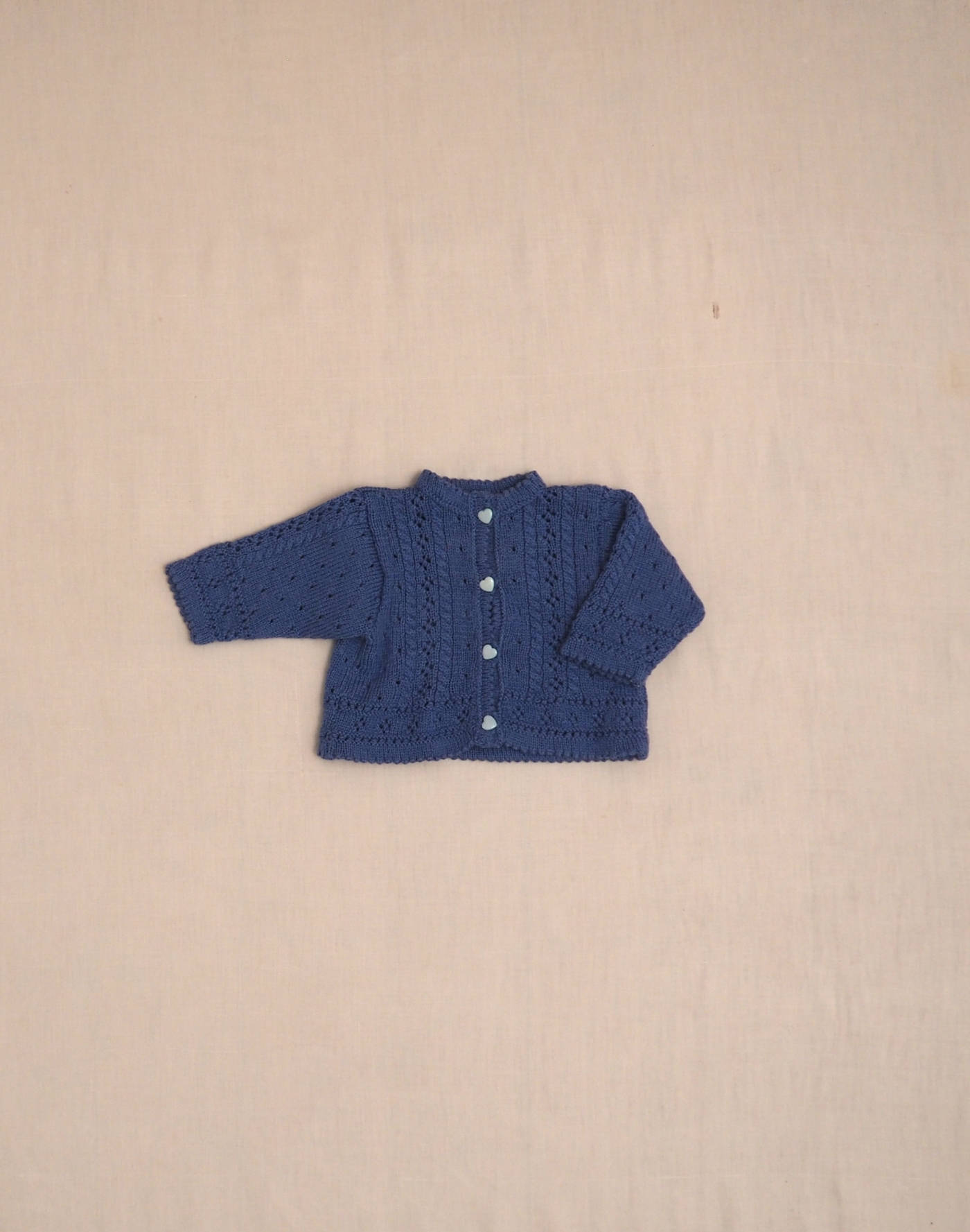 Blue hand-knitted cardigan
