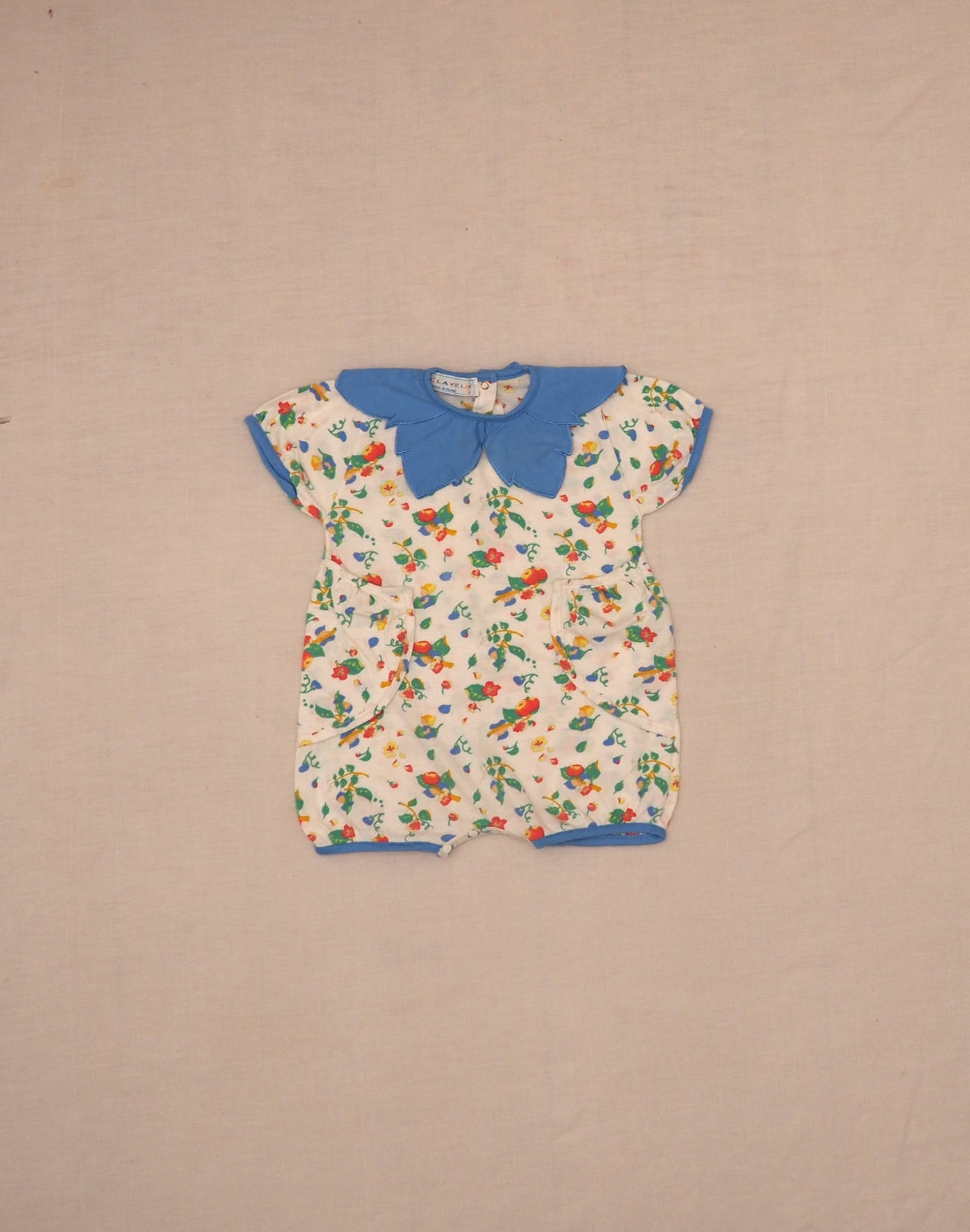 Elf romper with flower collar