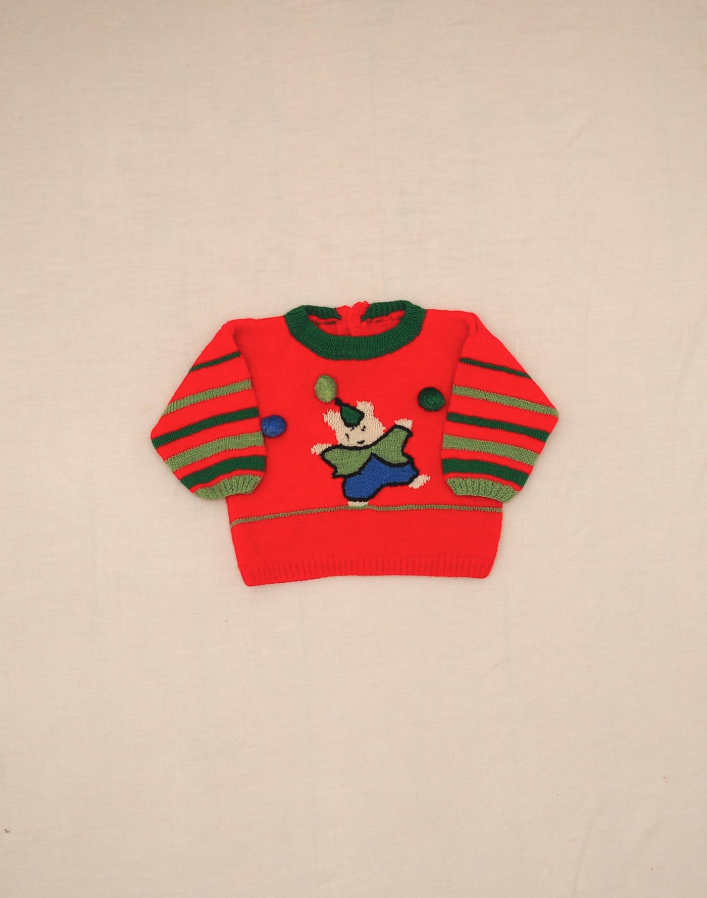 Hand-knitted juggling rabbit sweater