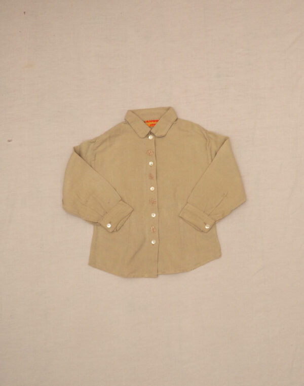 Beige shirt with small embroidery