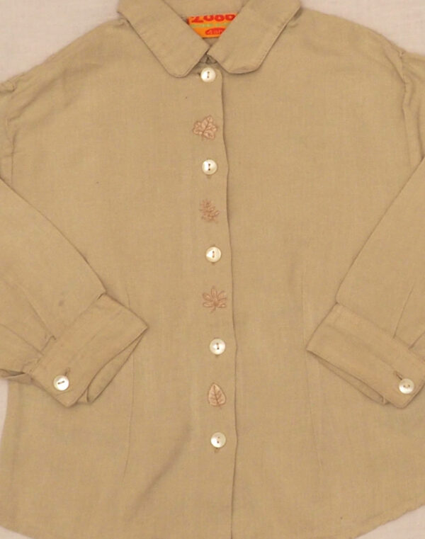 Beige shirt with small embroidery