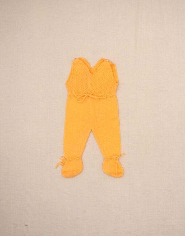 Hand-knitted yellow romper