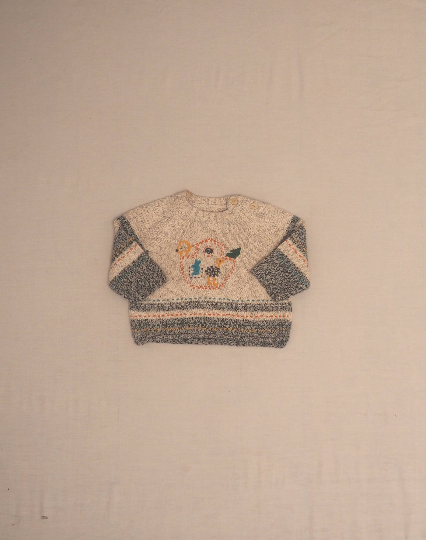 Mottled and embroidered sweater