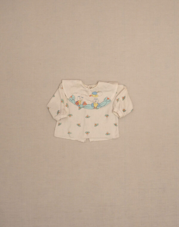 Blouse velours à grand col