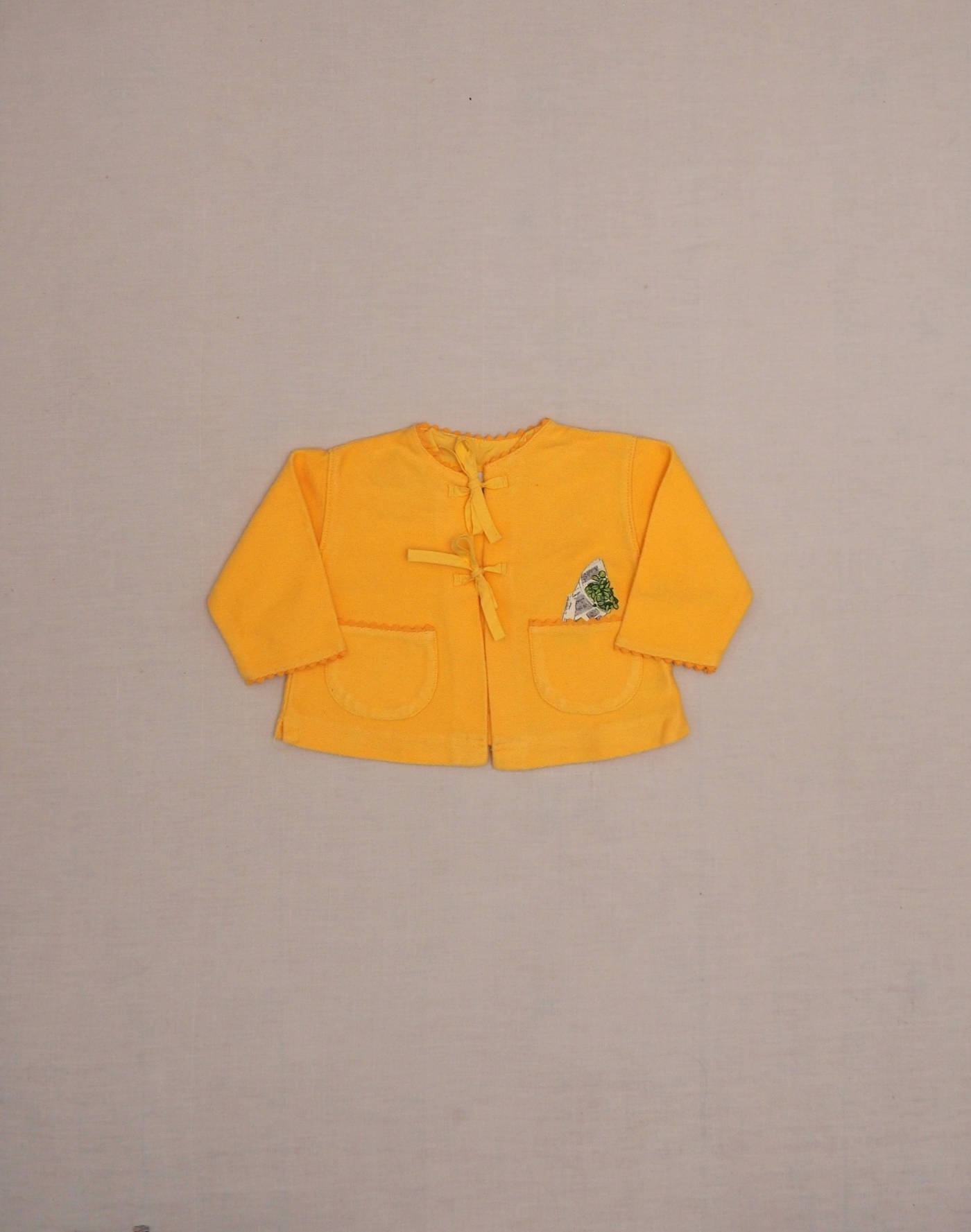 Cardigan brodé plante