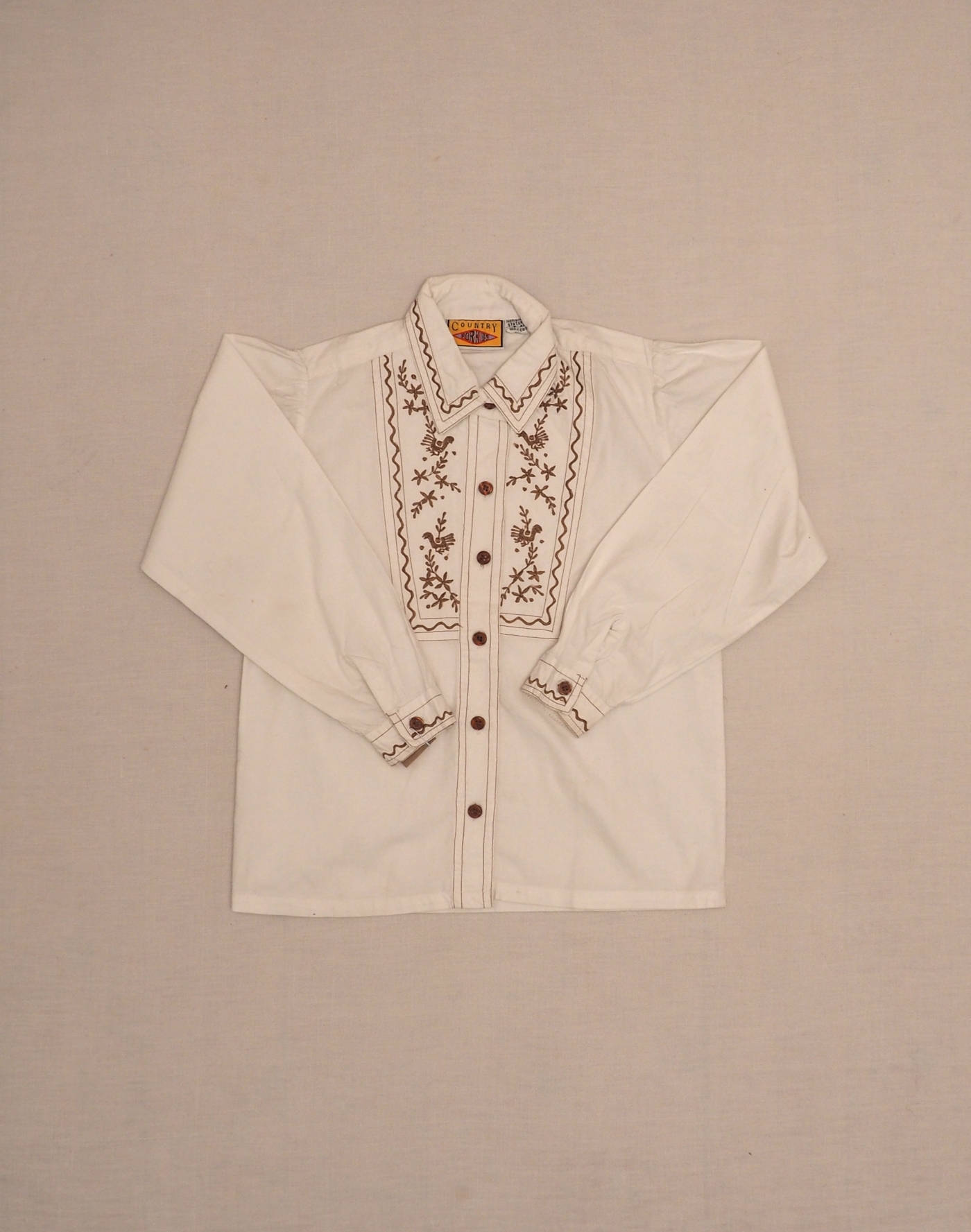 Embroidered white shirt 8 years