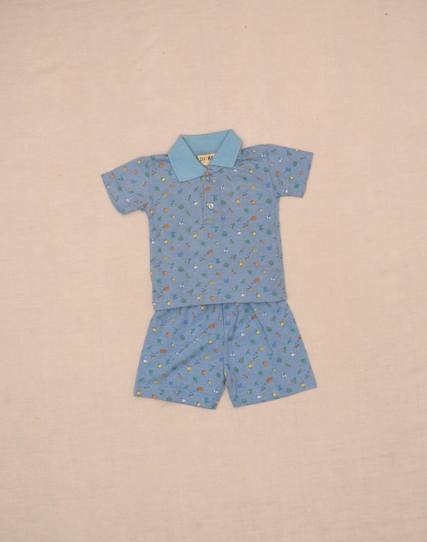 Ensemble polo & short à petits motifs