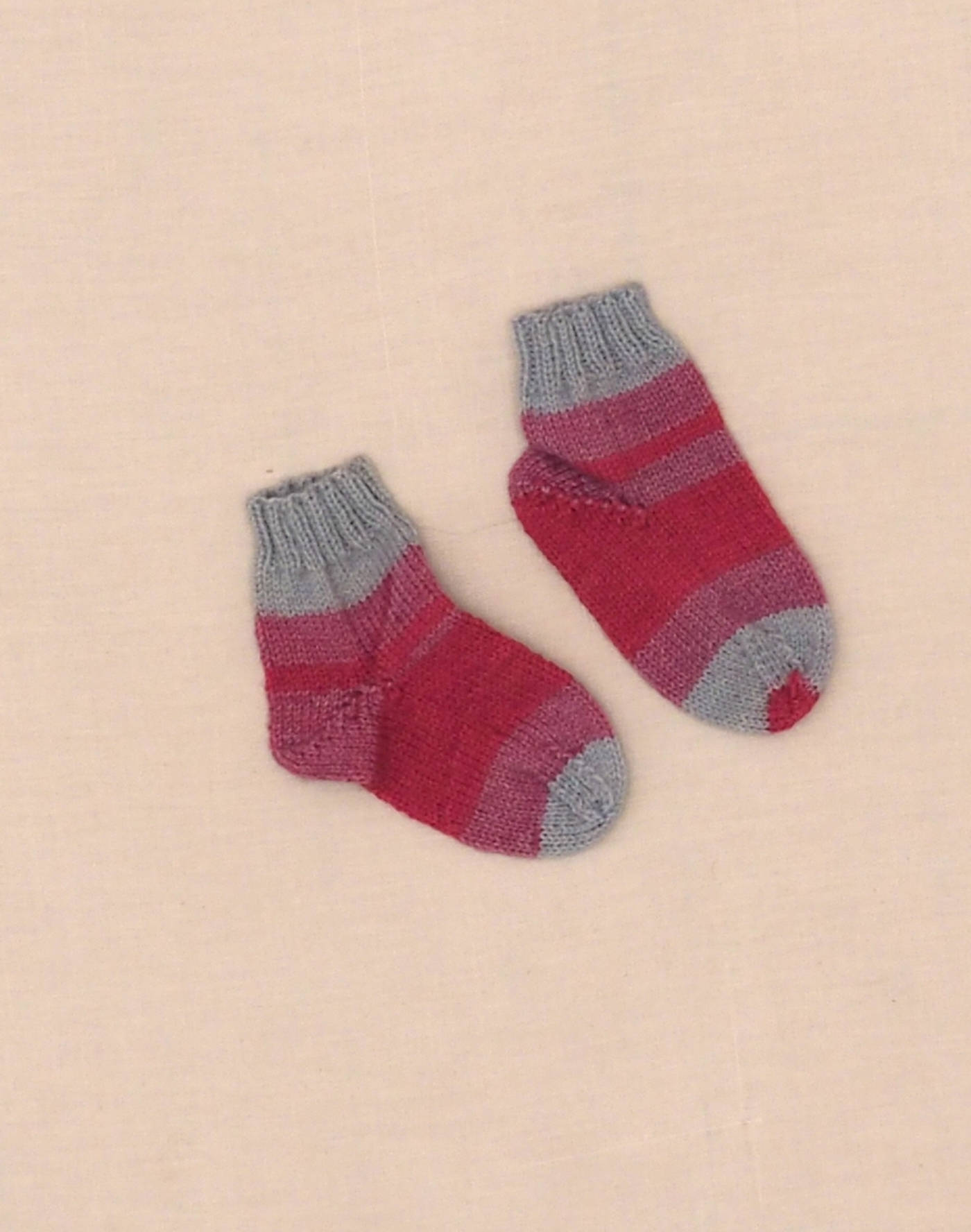 Hand-knitted raspberry striped socks P20