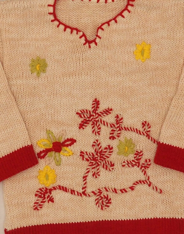 Pull écru broderies main