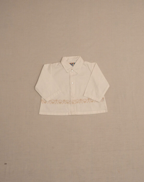 White jacket with embroidered frieze