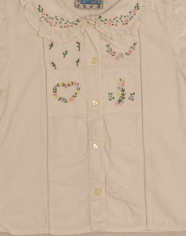 Flower embroidered blouse