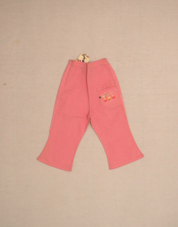 Pink pants with three radishes