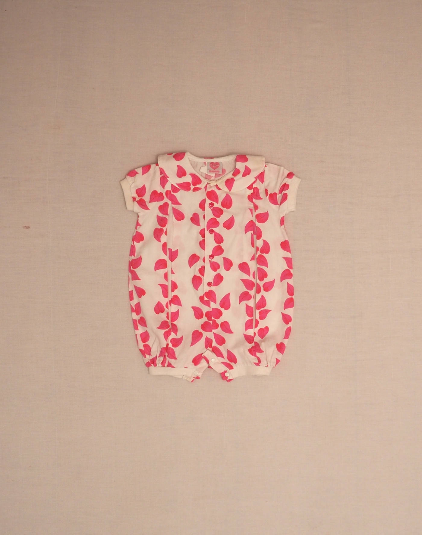 Barboteuse feuilles roses