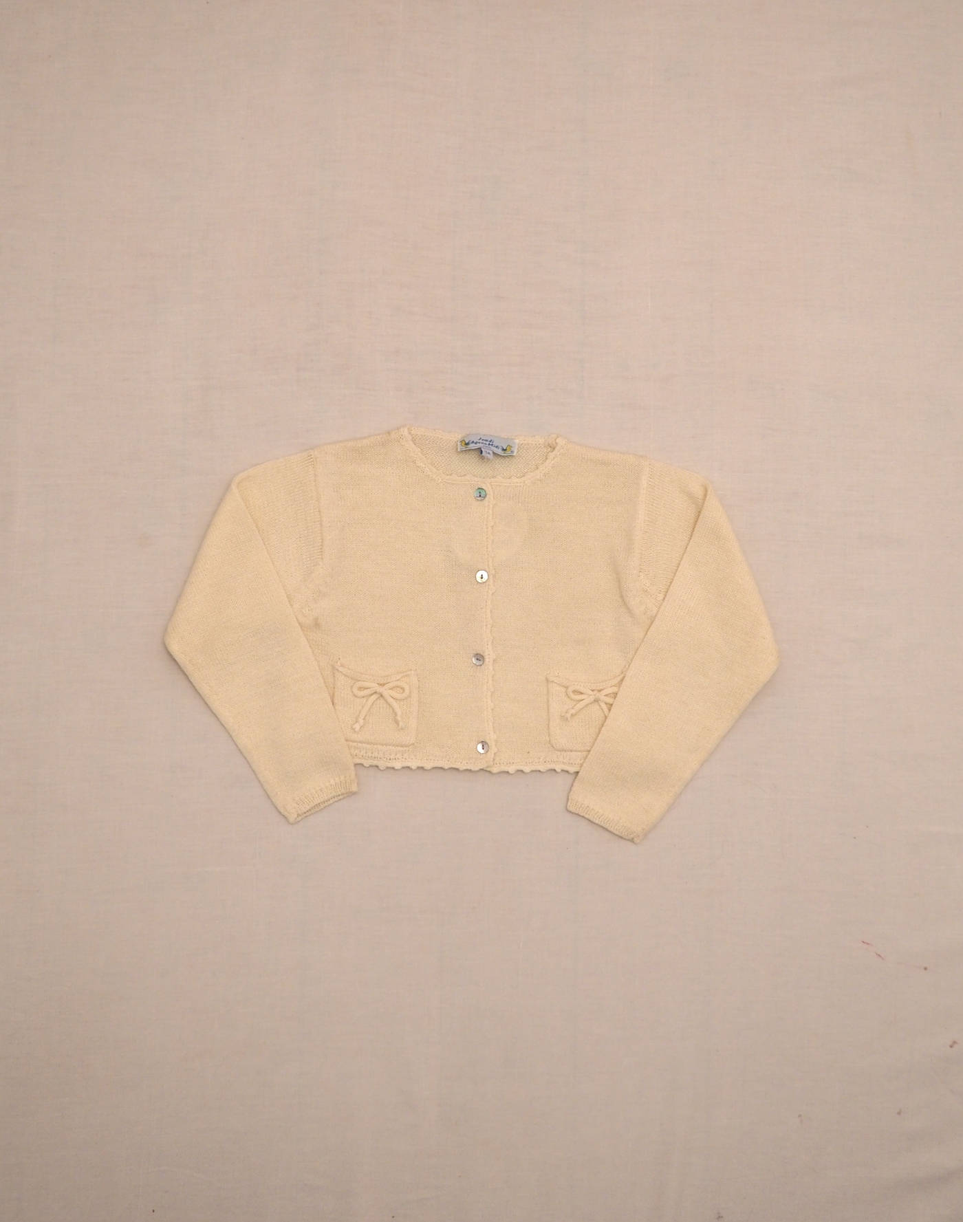Cardigan écru petits noeuds