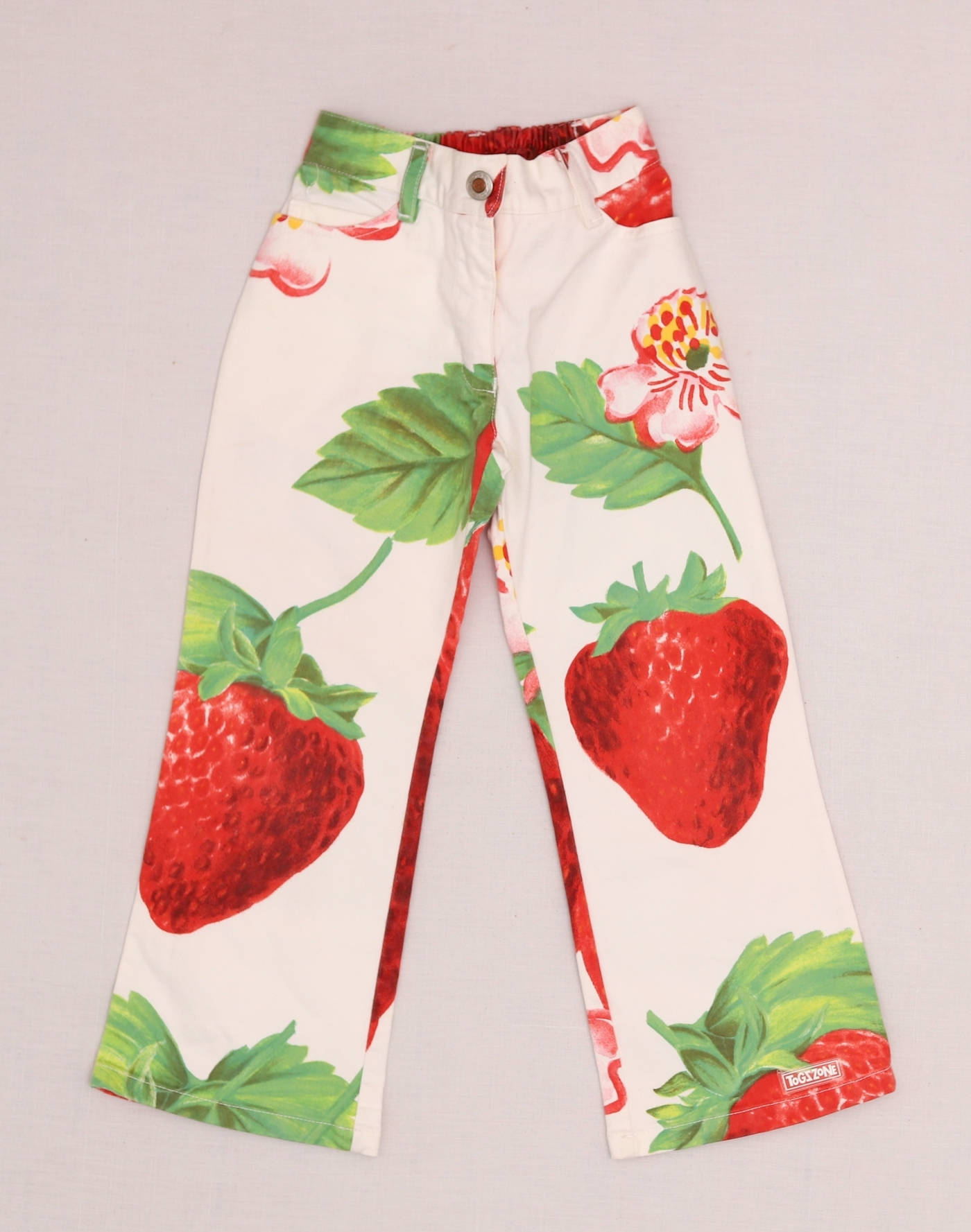 Flared jeans with large polka dots