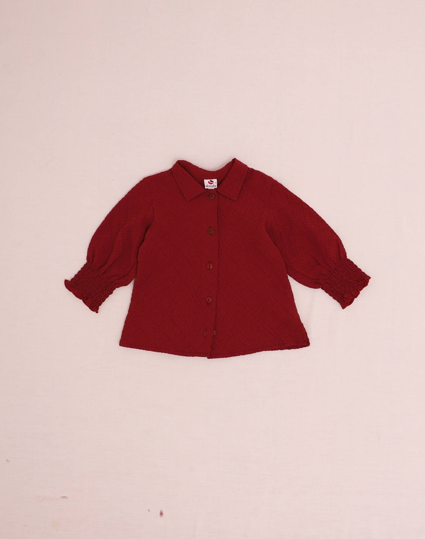 Textured plum-colored shirt
