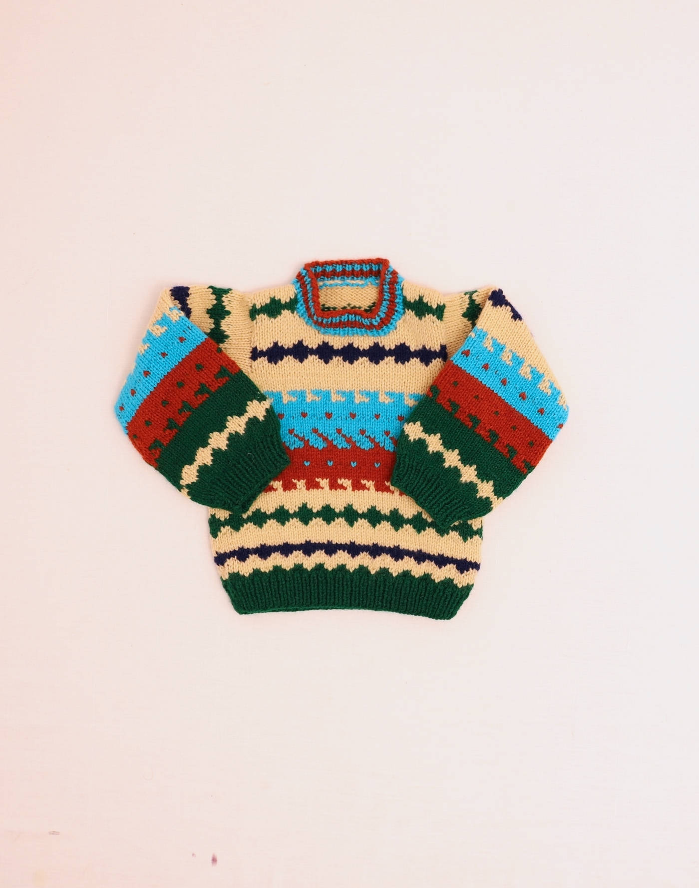 Pull à motifs fait main 6 ans