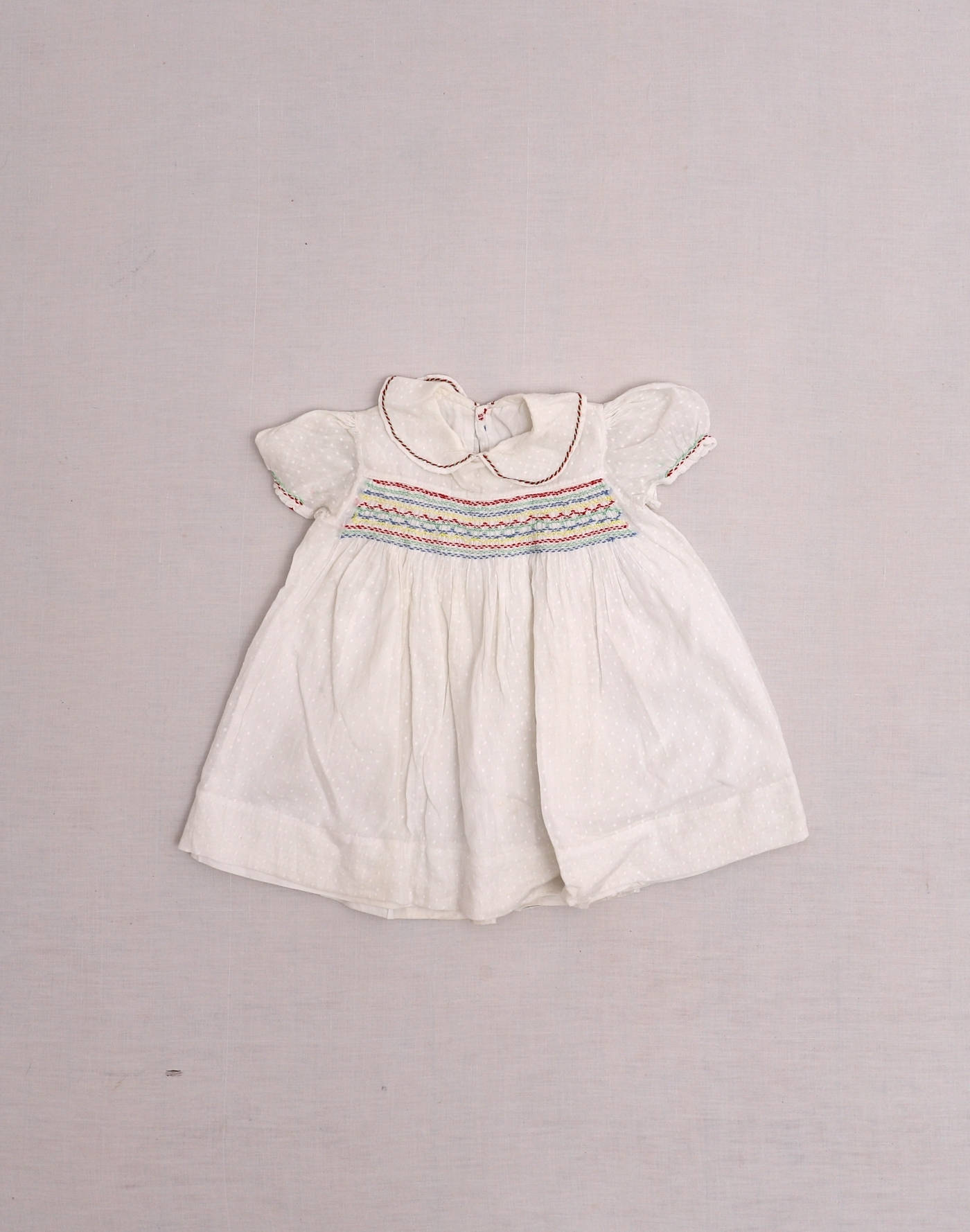Multicolored smocked plumetis dress
