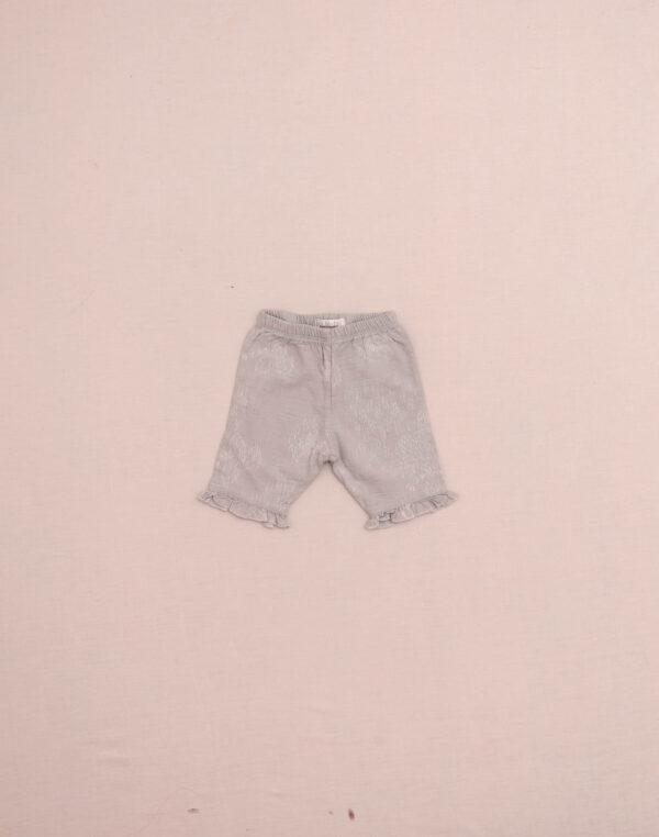 Pantalon argenté doublé brodé
