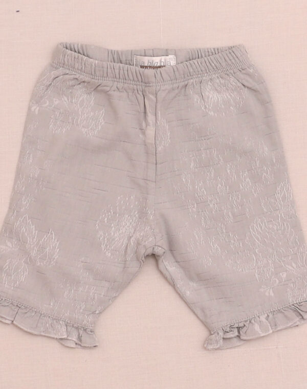 Pantalon argenté doublé brodé
