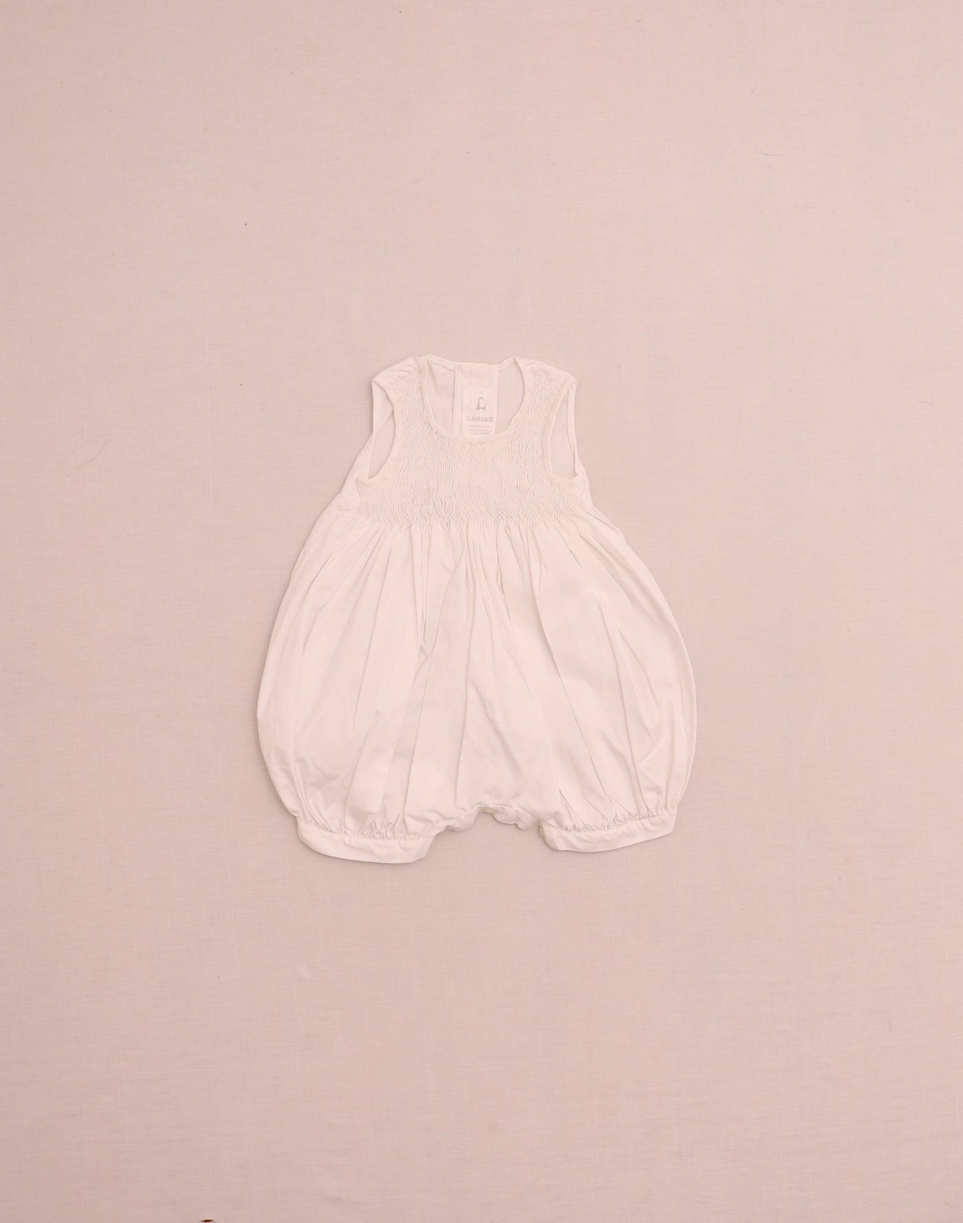 Barboteuse à smocks & lapins