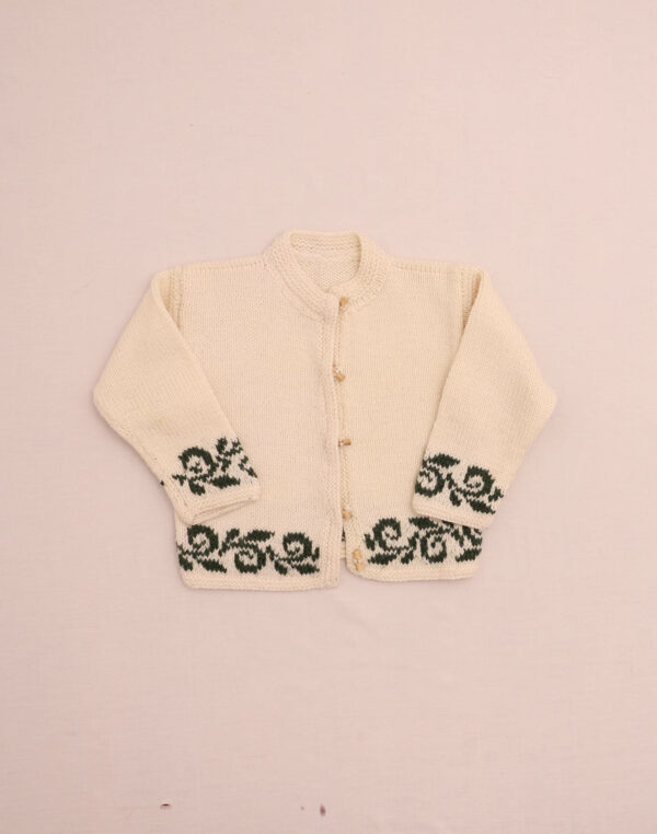Cardigan à frise fleurie tricoté main 6 ans