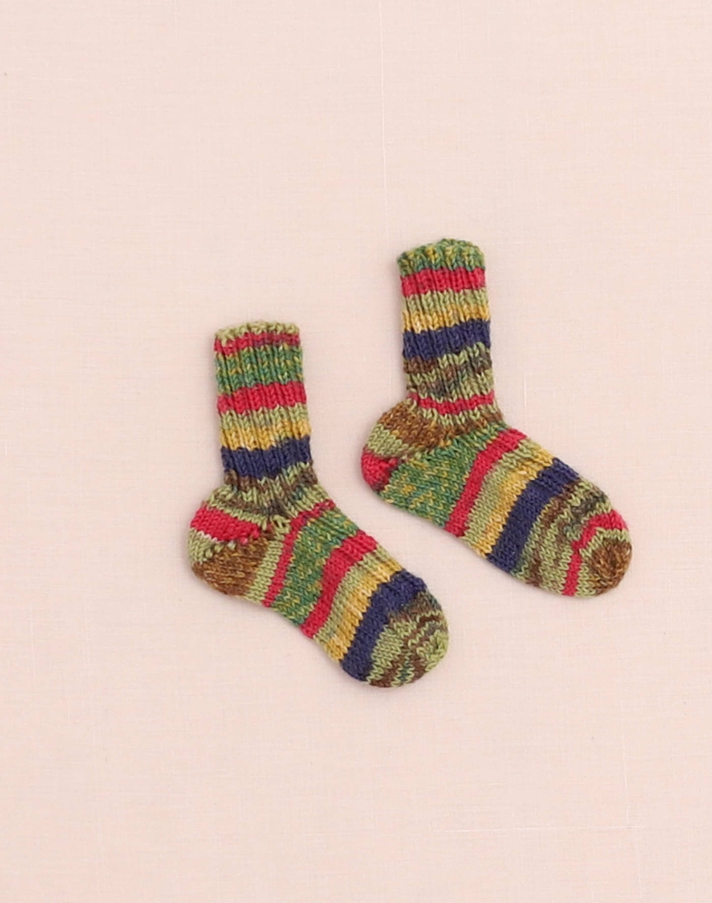 Chaussettes tricotées rayées framboise P19