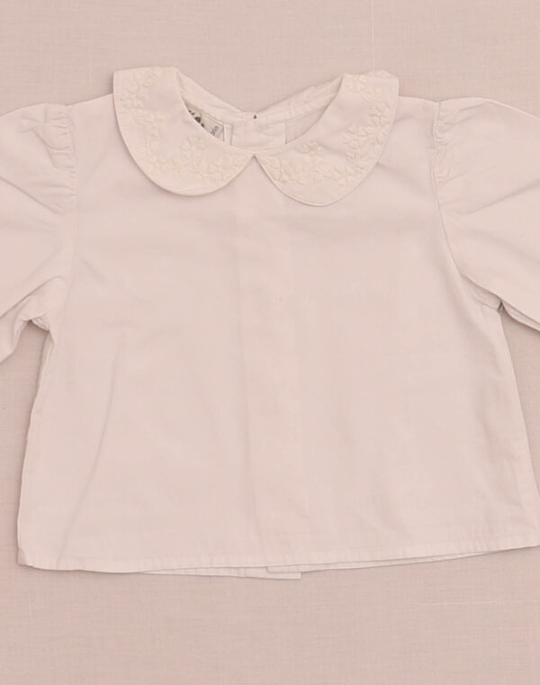 Blouse à col brodé